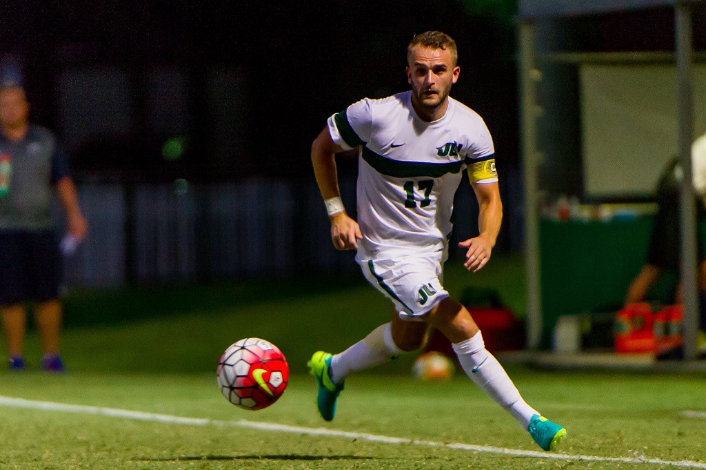 Jack Burns with the ball in Youth Soccer Academy