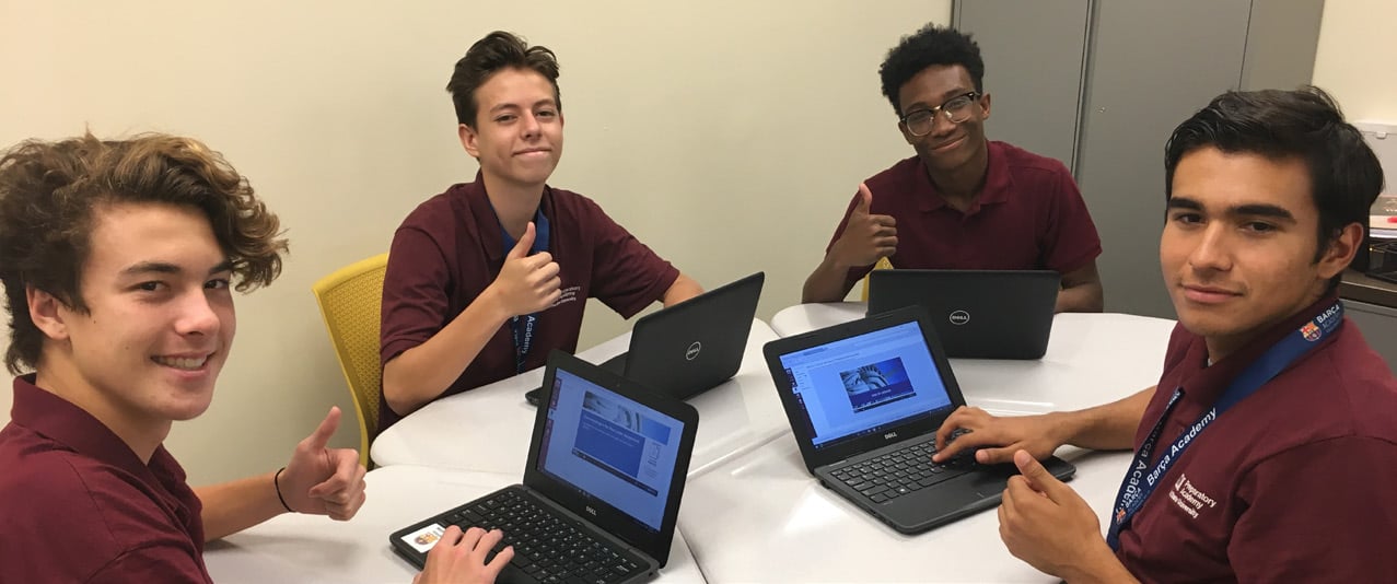 Students study together at boarding school soccer academies.