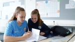 Language classes at Manchester City Football Soccer Camp 2024. Left picture