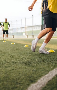 Players training at a high-performance football academy