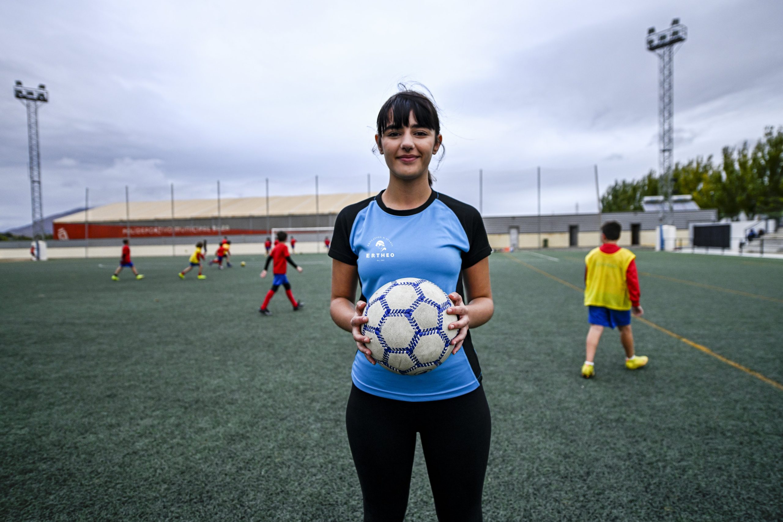 Training session at a high-performance football camp, with no scouts present